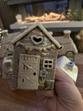 Stonewear Garden Shed with embossed blue flower Tea Light Holder