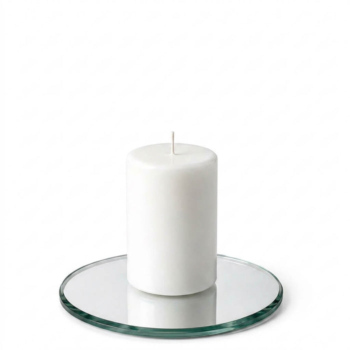 5" Round Mirror Coaster with a white pillar candle on a white background