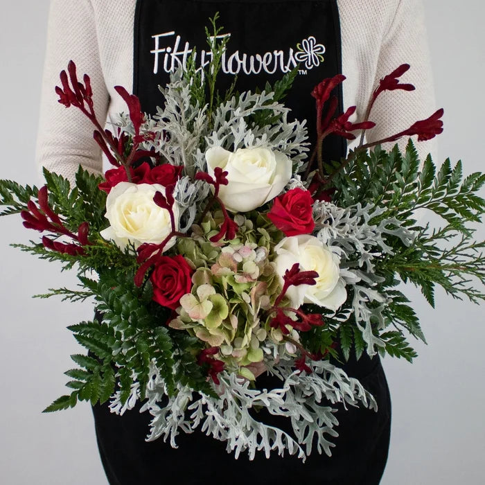 Frosty Grey Christmas DIY Flower Bouquet in Hand