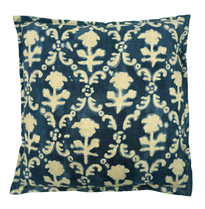 Decorative pillow with floral pattern on a blue background
