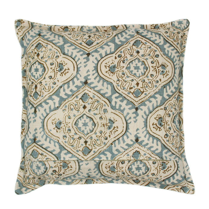 A blue, cream and brown linen cushion with a central motif pattern.