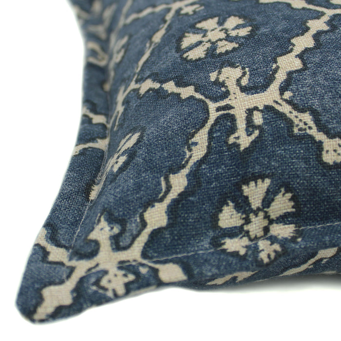 A blue and cream linen cushion with a traditional Uzbekistan hand block prints pattern.