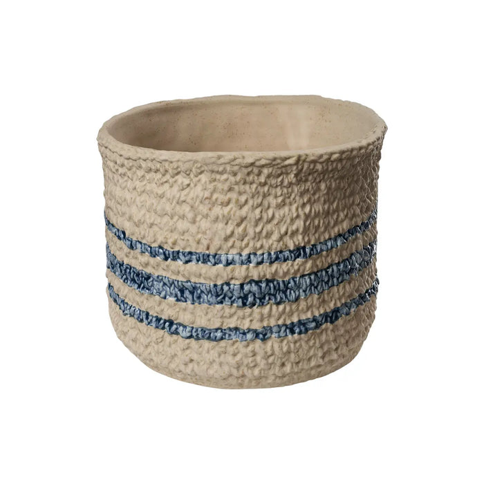 Woven basket with blue stripes on a white background