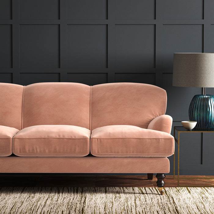 Pink eco velvet upholstery fabric on a sofa