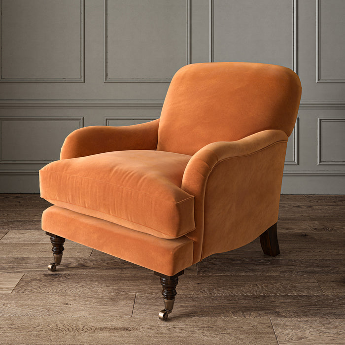 Orange eco velvet upholstery fabric on an armchair