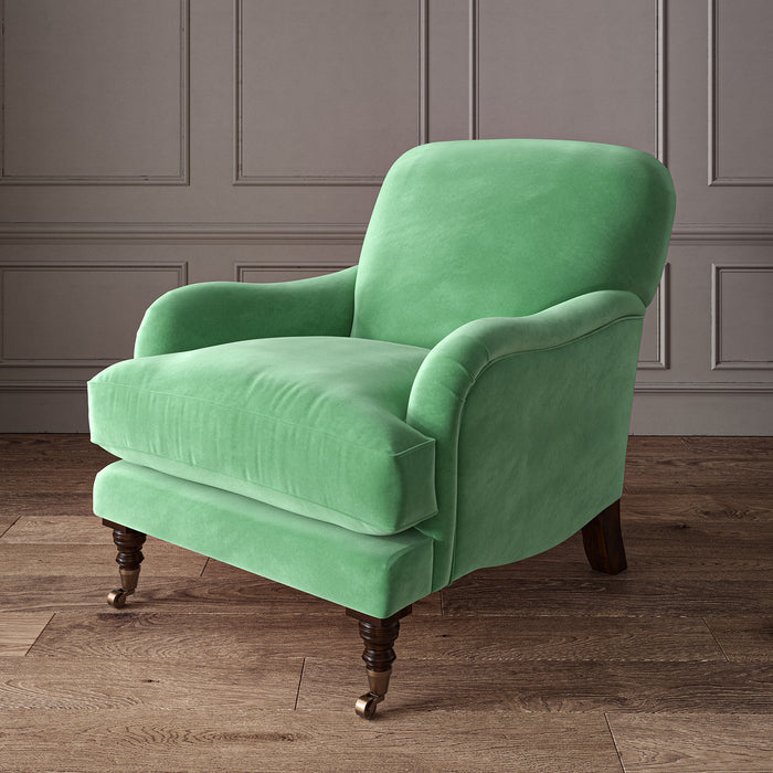 Green eco velvet upholstery fabric on an armchair