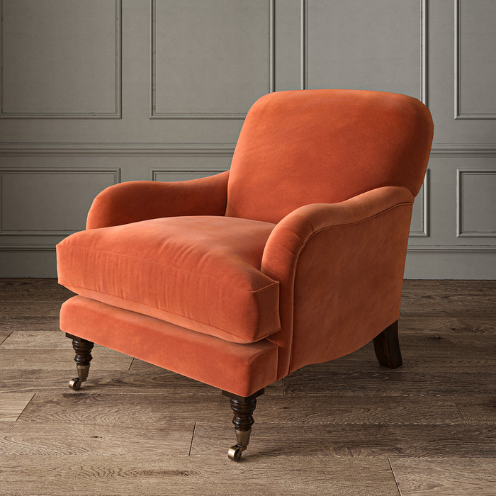 Orange eco velvet upholstery fabric on an armchair