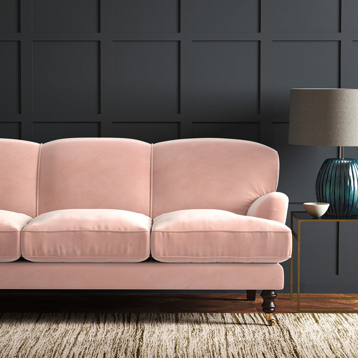Pink eco velvet upholstery fabric on a sofa
