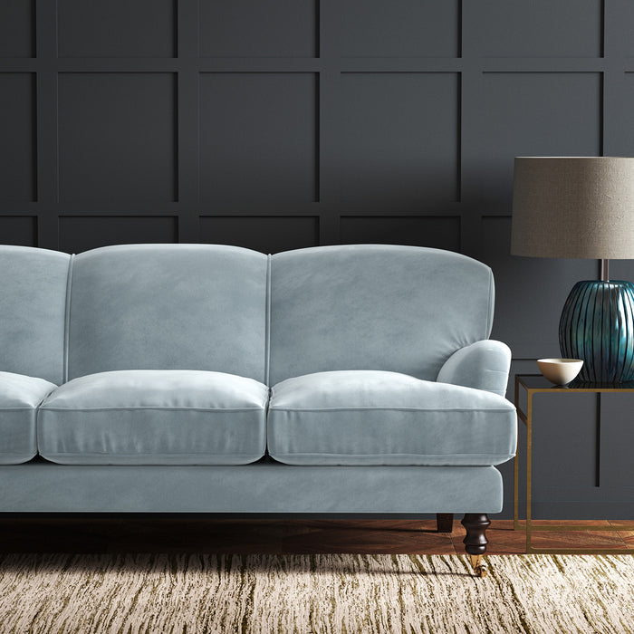 Blue eco velvet upholstery fabric on a sofa