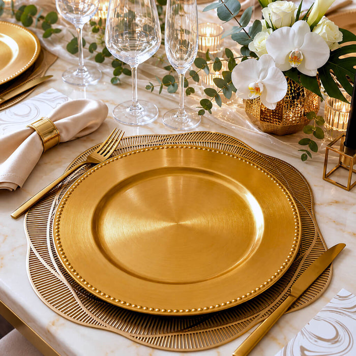 13" gold beaded charger plate on a decorative gold mat