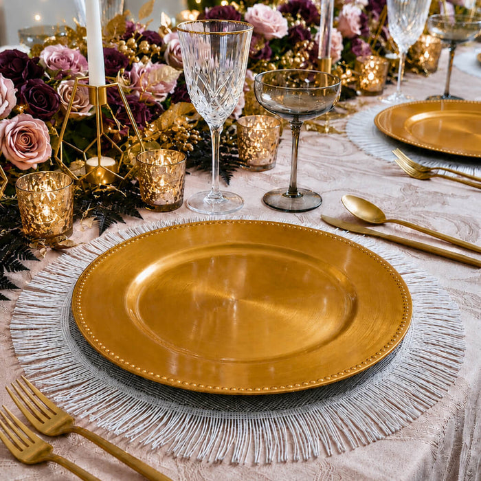 13" gold beaded charger plate, floral centerpiece, and gold holders
