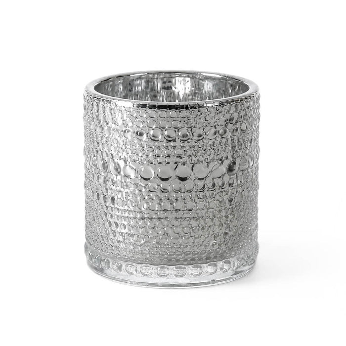 Pearly silver candle holder with textured bubble design on white background