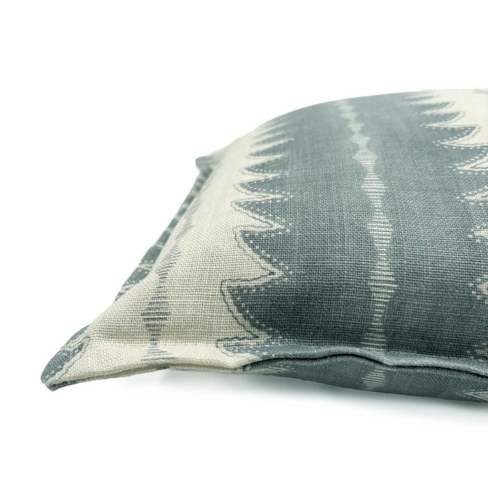 Light blue linen cushion with a fern design.