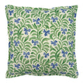 Decorative cushion with a green and blue floral pattern.