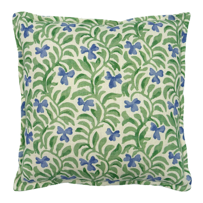 Decorative cushion with a green and blue floral pattern.